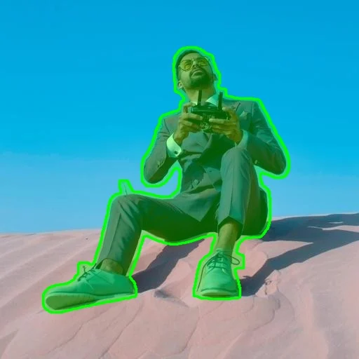 Person and cast shadow selected with a green mask in a desert
